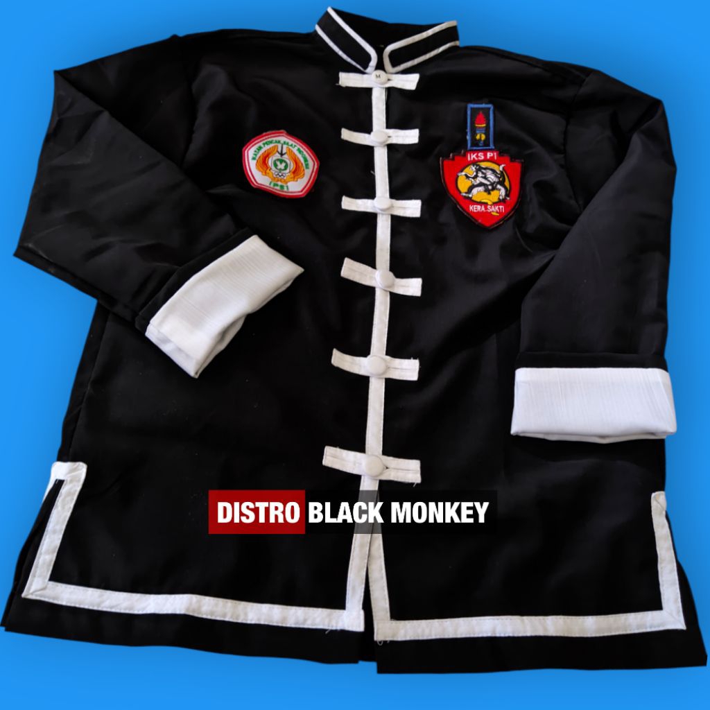 baju iks.pi / baju atasan sakral iks.pi bahan dril / seragam hitam iks.pi kera sakti /sakral warga