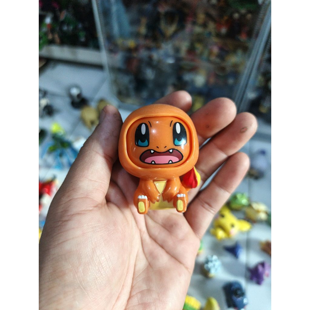 figure changing face pokemon charmander
