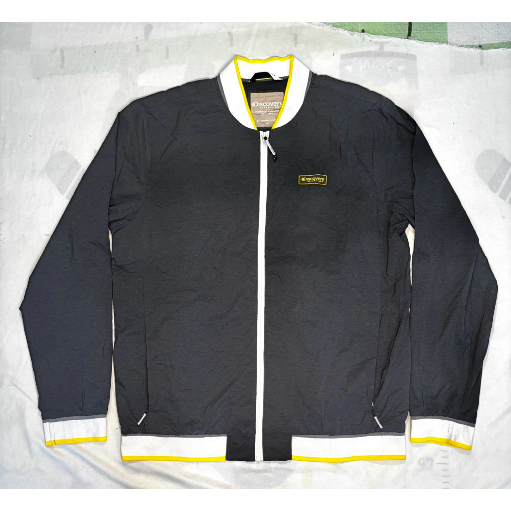 jaket running discovery