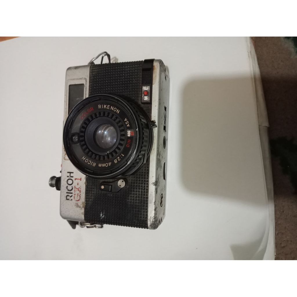 kamera Ricoh GX 1.minus mati perlu serpis..
