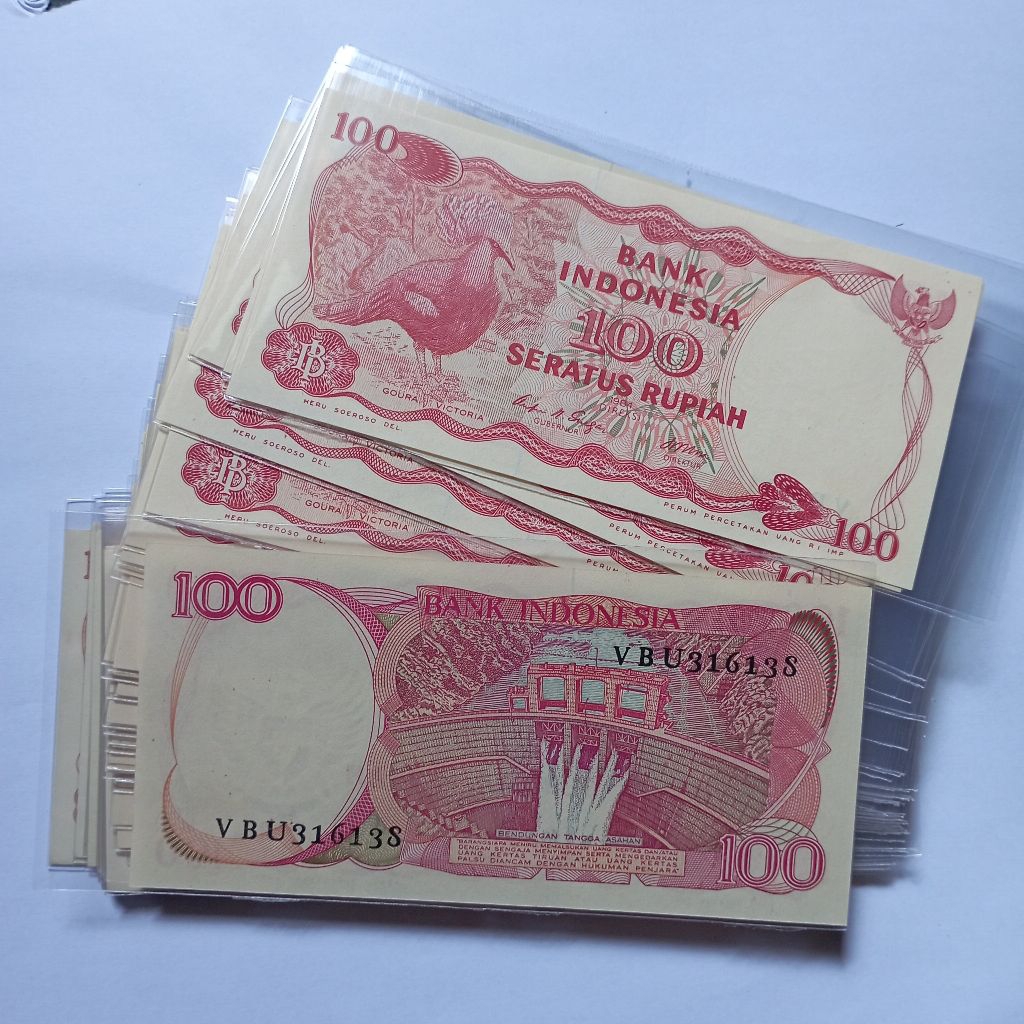 100 rupiah uang kertas burung dara tahun 1984 baru asli