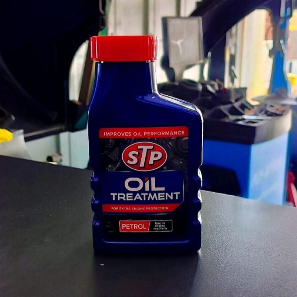 STP Bensin Oli Treatment campuran addivite oli mesin mobil motor