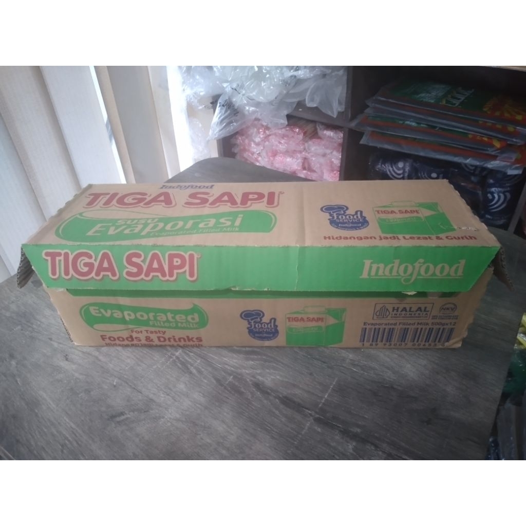 susu evaporasi Tiga sapi 1 dus 500 gramx12