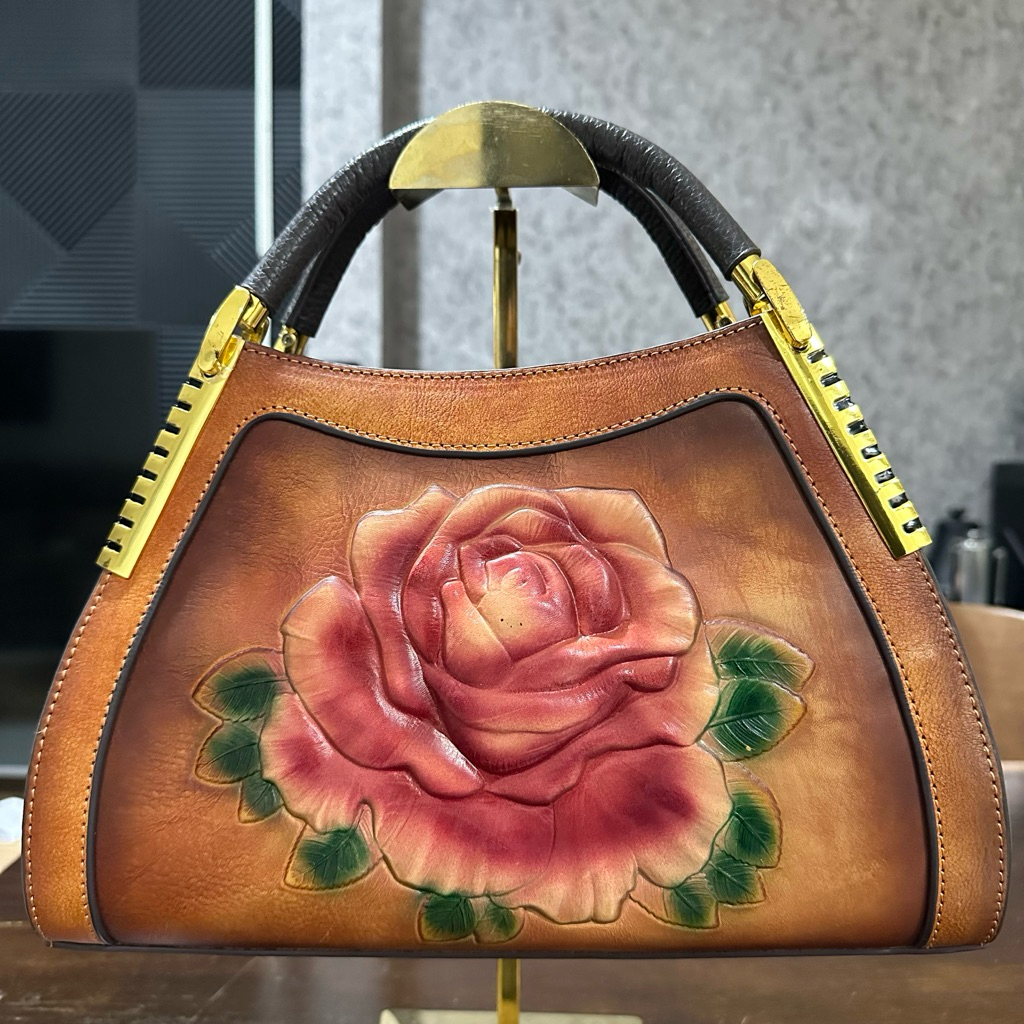 Vintage Floral Embossing Leather hand and sling bag from Versace