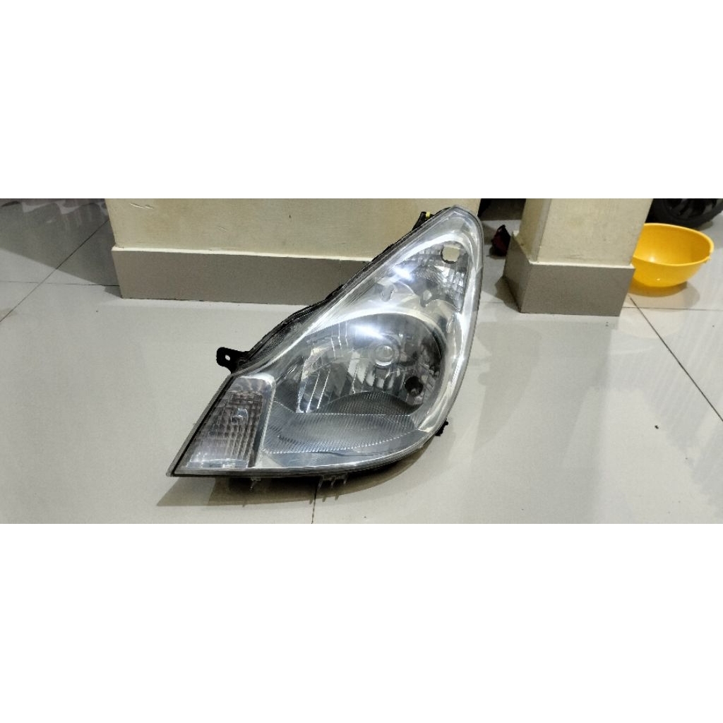 reflektor lampu depan bagian kiri Karimun Estilo original