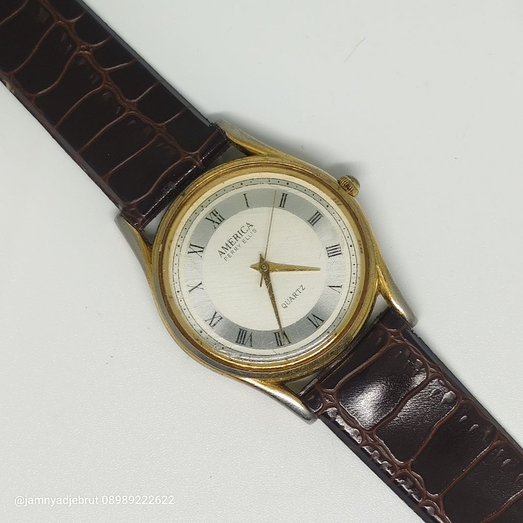 Jam America Perry Ellis APE1323 Vintage Gold Bekas