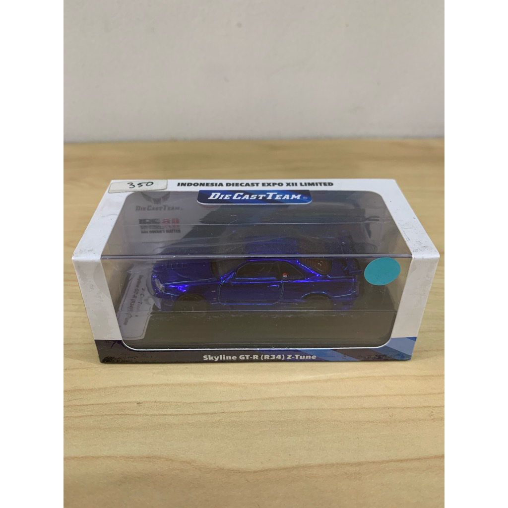 die cast team skyline gt-r (r34) z-tune biru