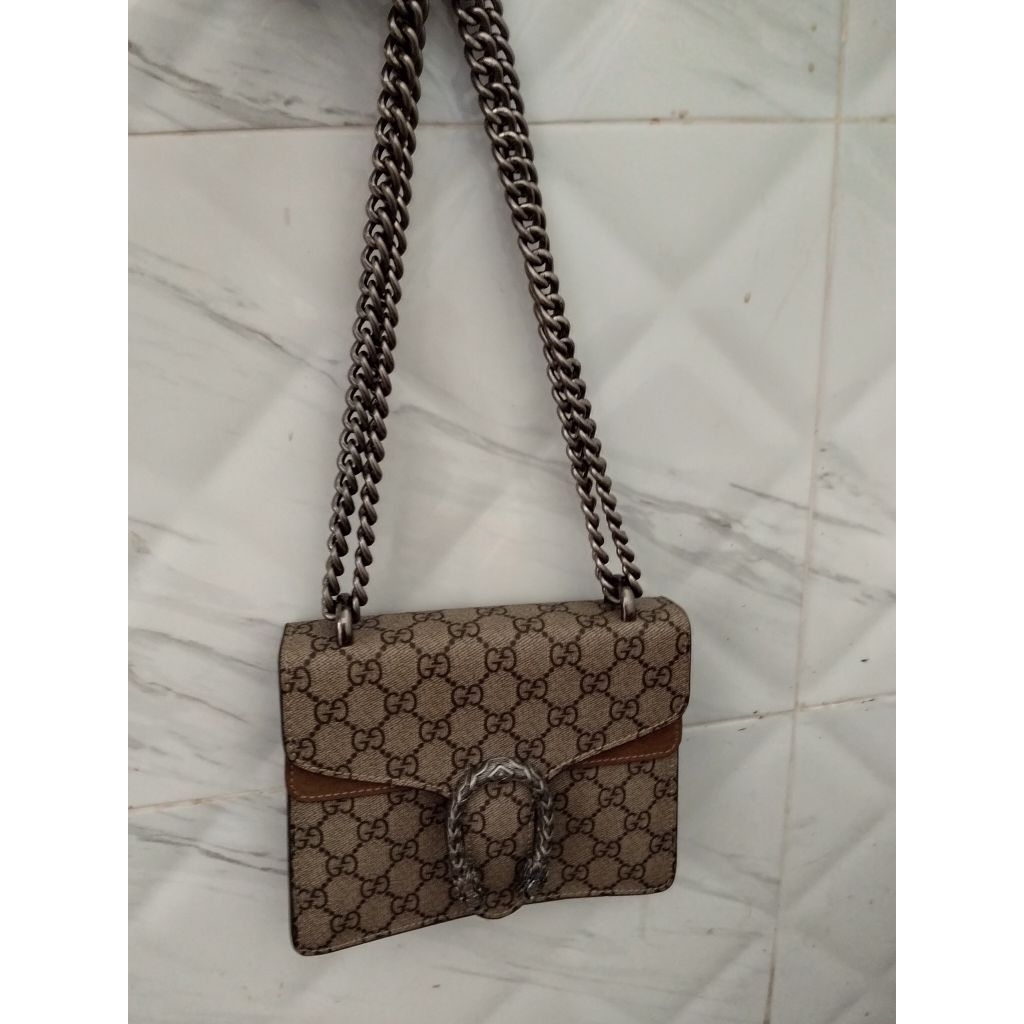 Gucci size mini 20cm muat hape Ama dompet lipat aja.