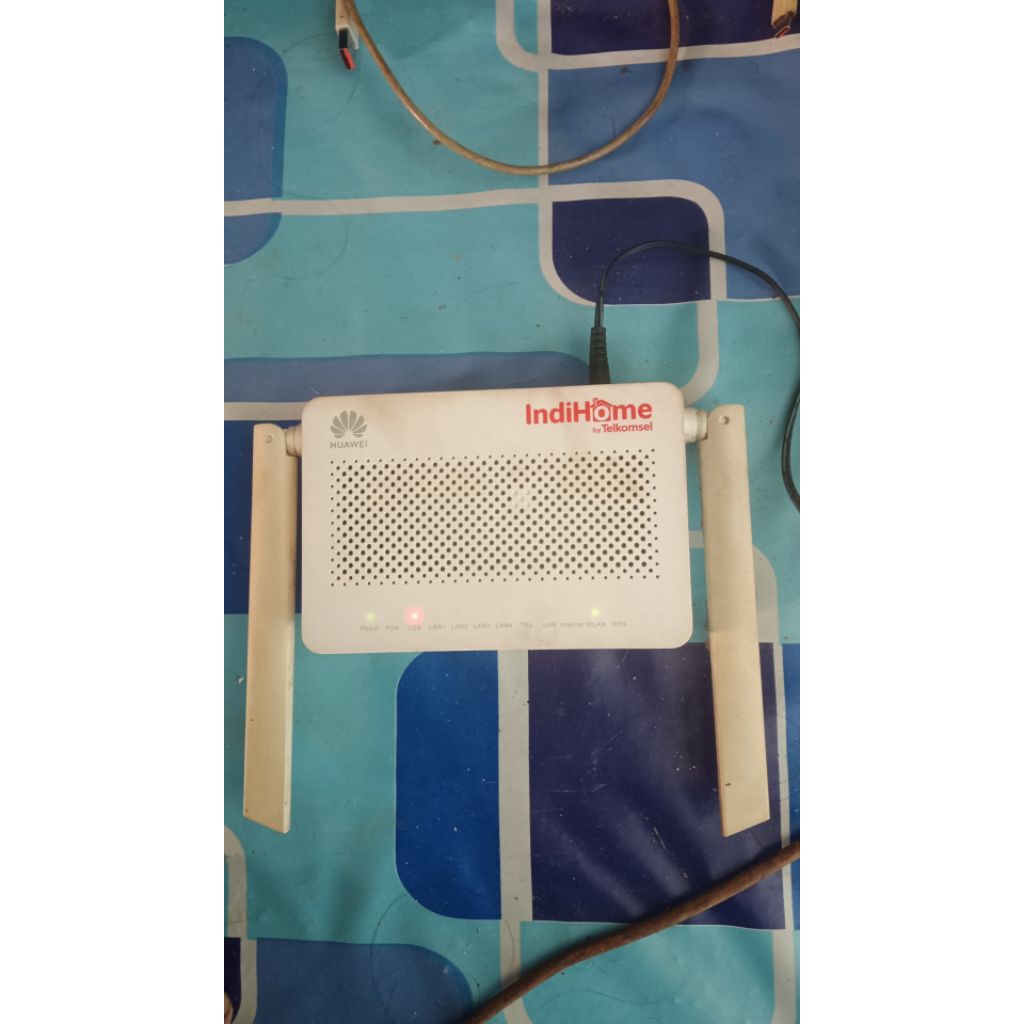 ROUTER HUAWEI BEKAS PAKAIAN INDI**
