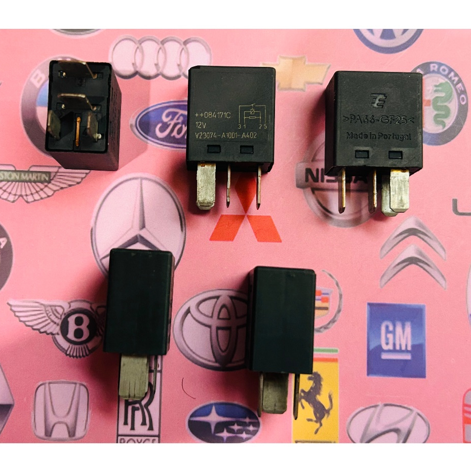 Relay Mobil Warna Hitam 12V 4 Kaki Universal Merk Tyco Part No.V23074-A1001-A402 / PA66-GF25 ( ORIGI