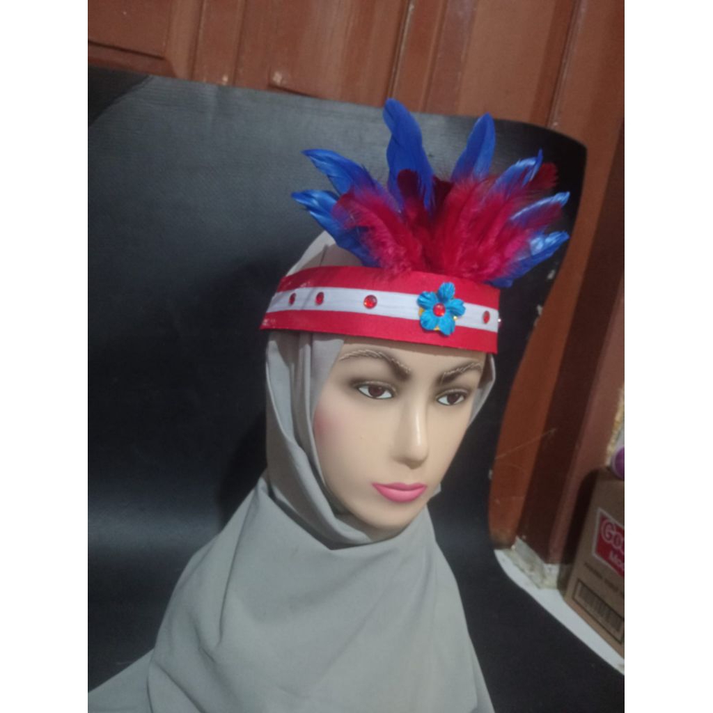 mahkota bulu dayak merah biru merah putih