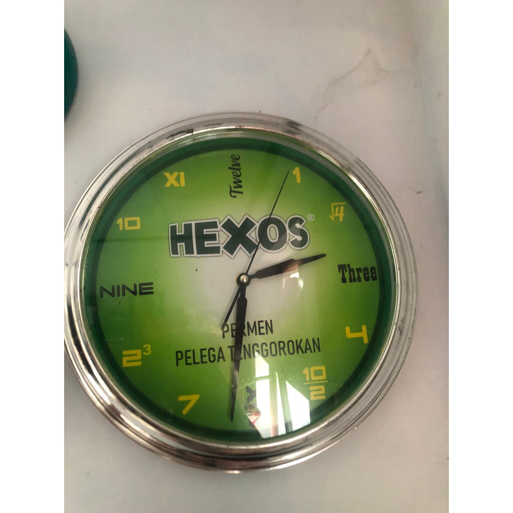 jam dinding iklan HEXOS
