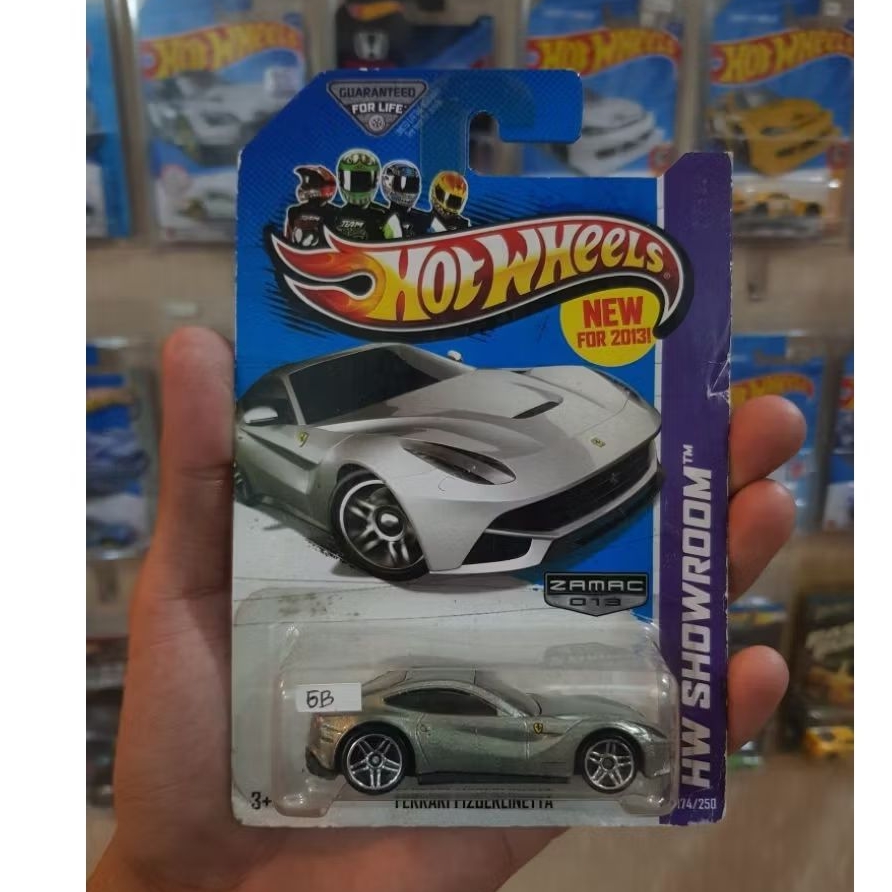 Mainan Hot Wheels diecast Ferrari F12 Berlinetta ZAMAC kondisi baru card tidak mulus