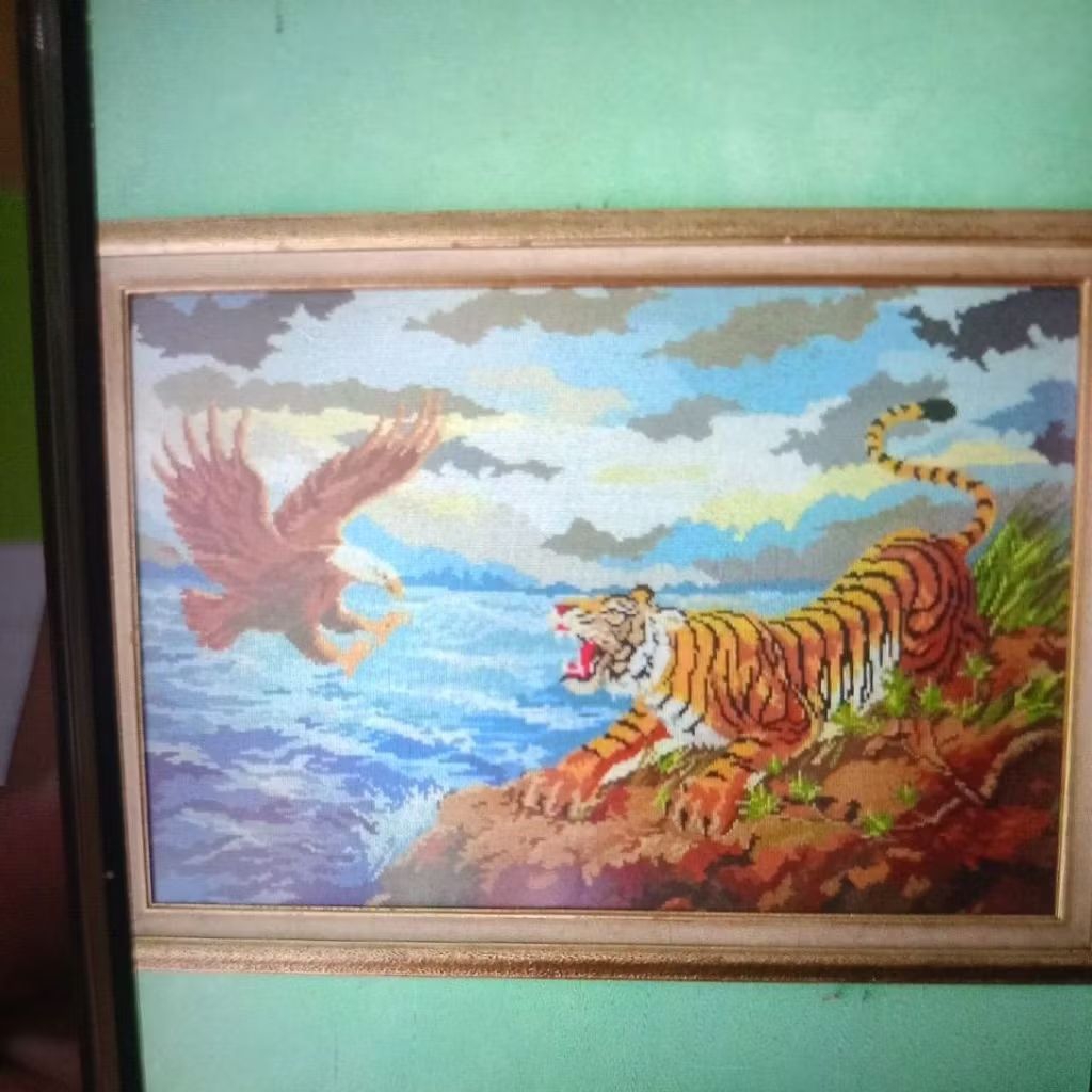 Kristik Harimau dan Burung Elang