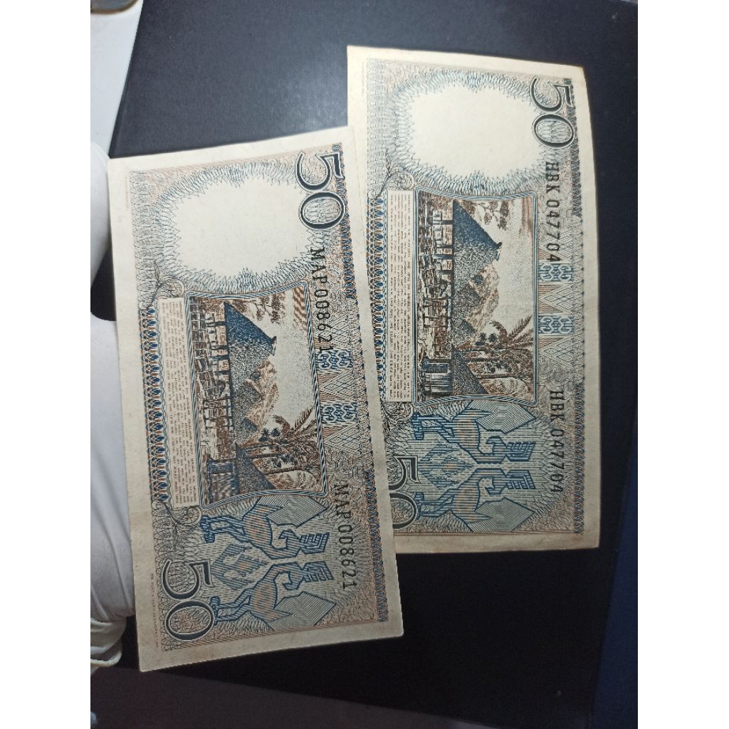 uang kuno 50 rupiah pekerja tahun 1964.