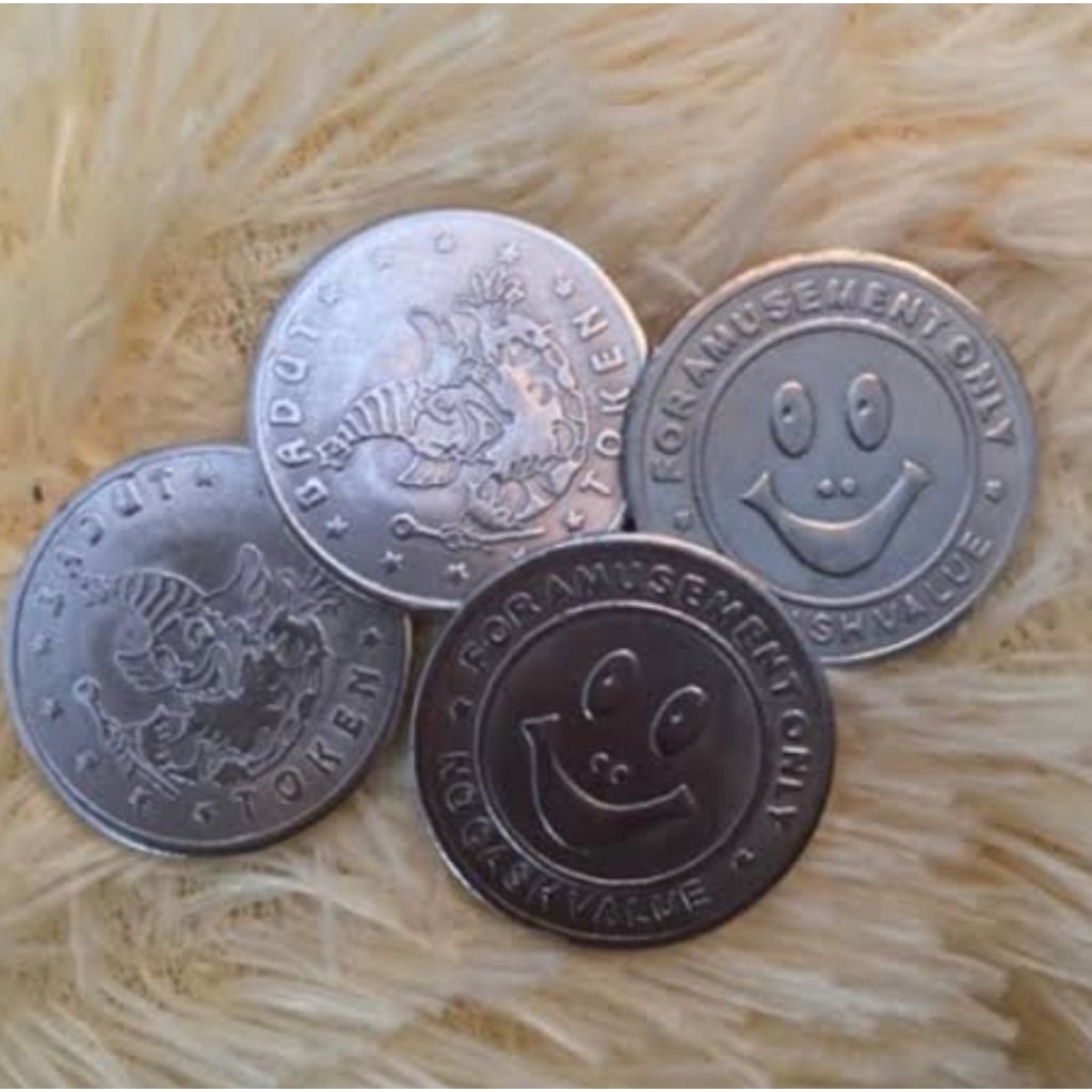 koin capit boneka badut