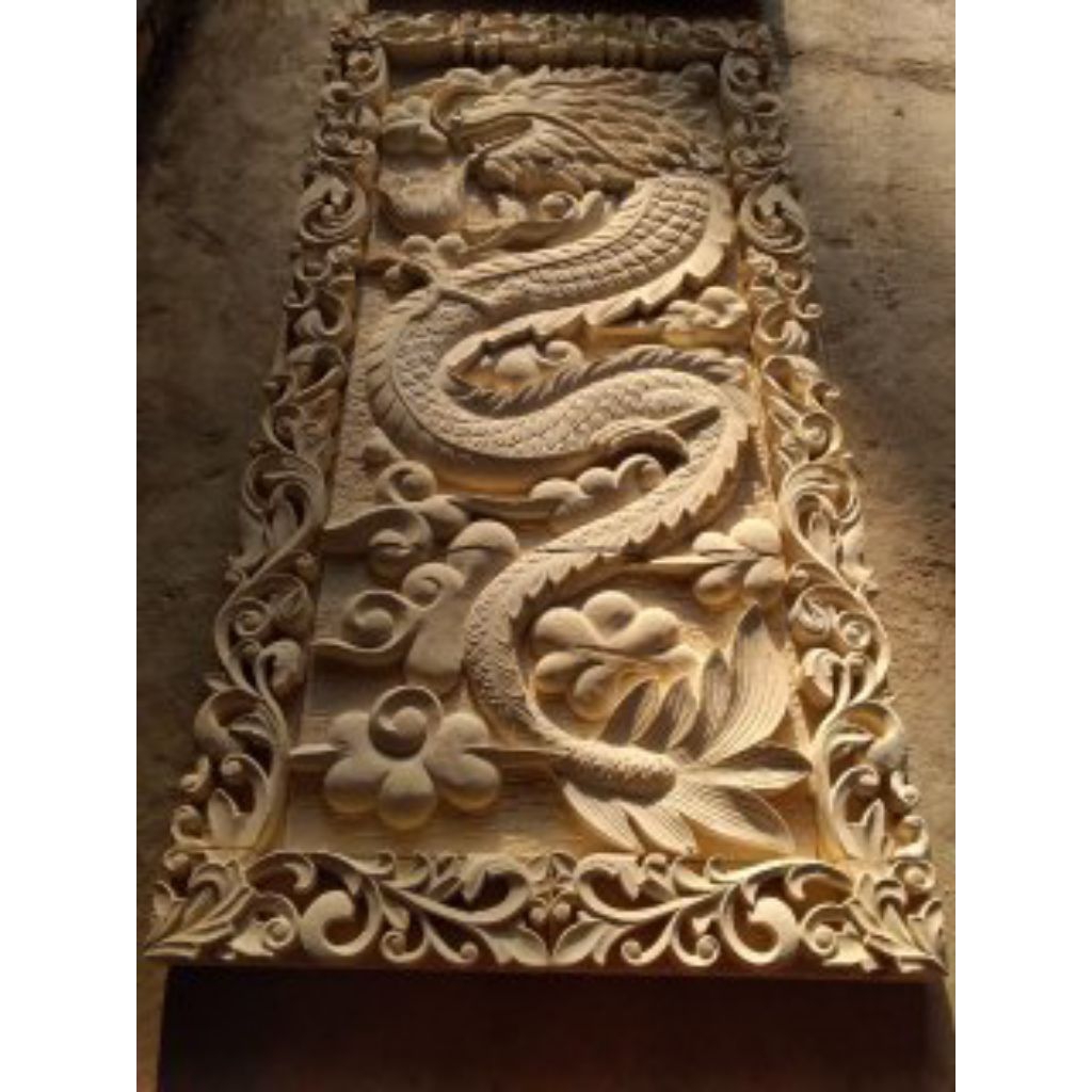 hiasan dinding relief batu alam