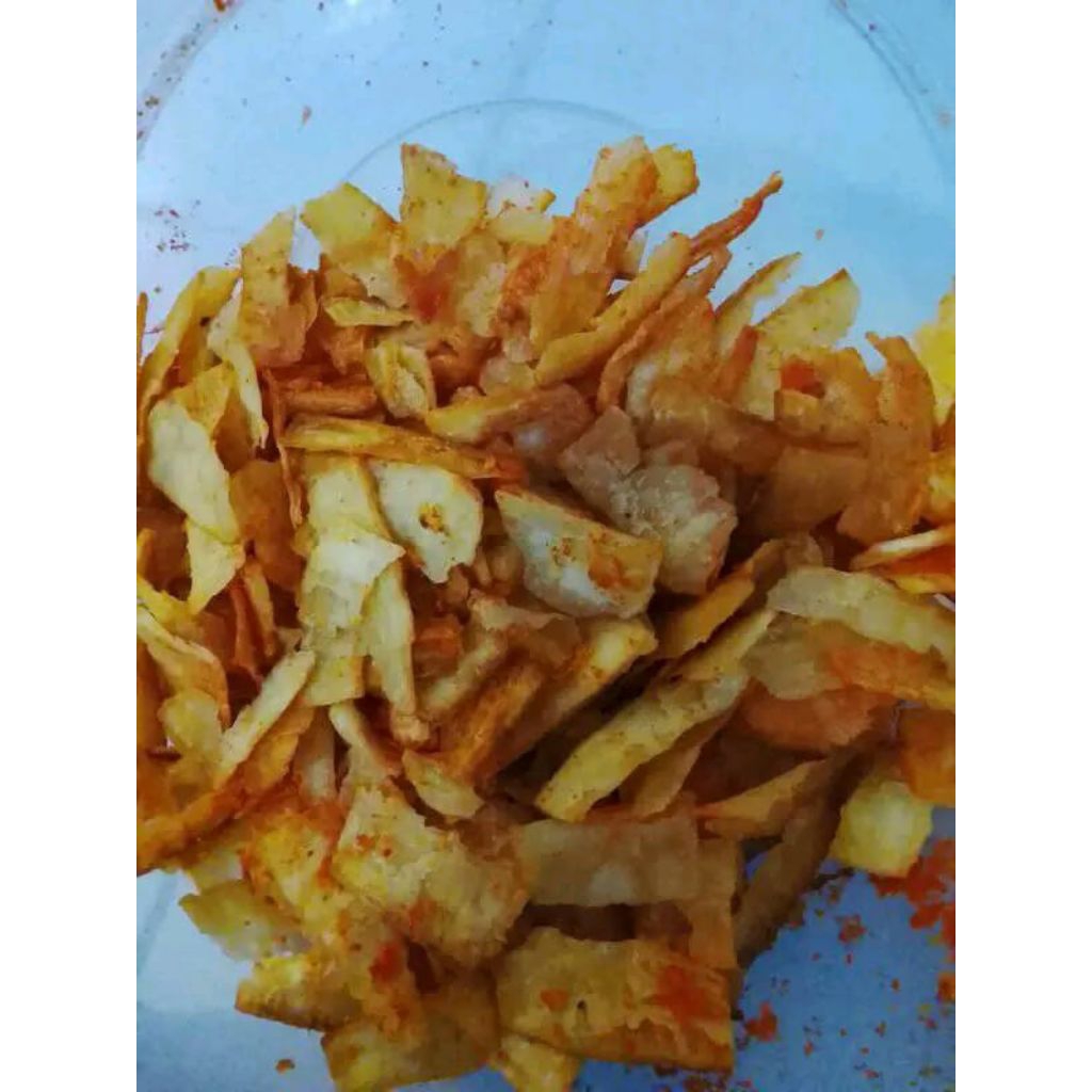 

Keripik singkong kukus siap makan, rasa pedas daun jeruk. Berat 250 gram