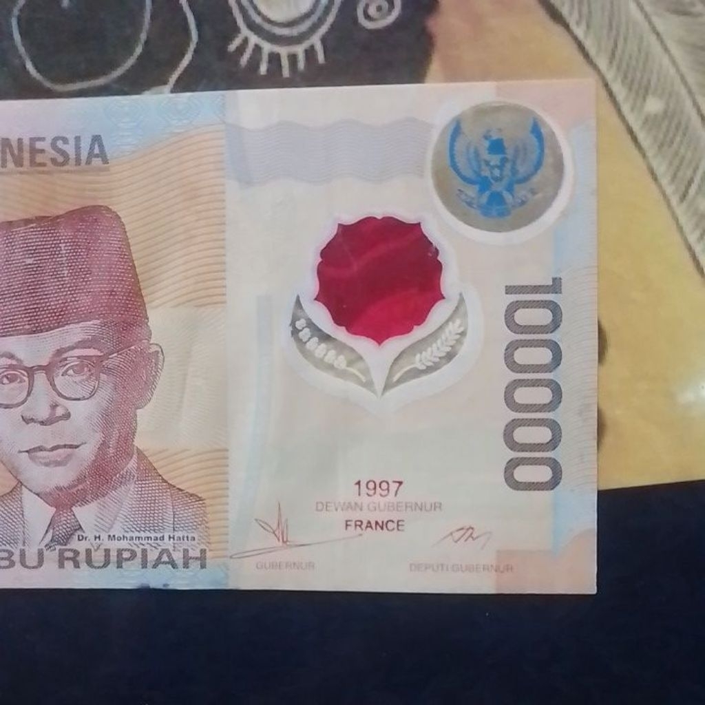 UANG 100000 MAWAR TAHUN 1997 GARUDA BIRU
