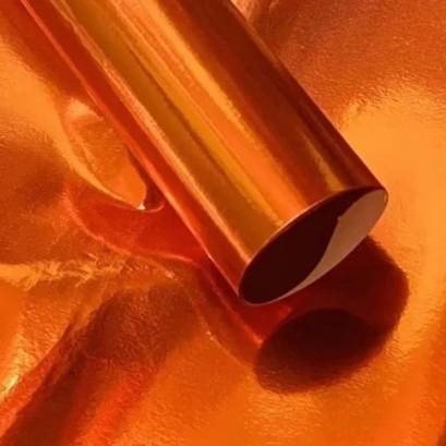 

KERTAS EMAS / KERTAS KILAP / KERTAS METALIK / KERTAS EMAS ORANGE 62 X 49 CM