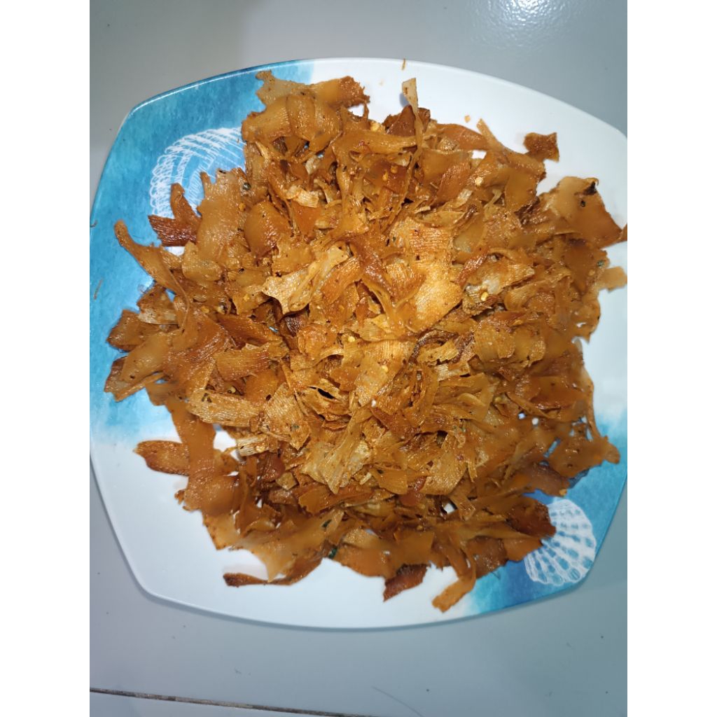 

Kripik Singkong Kriwil / KRIPIK SINGKONG PEDAS DAUN JERUK 125 GRAM