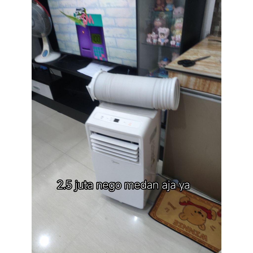 midea 1/2 PK ac portable bekas. bisa jadi dehumidifier medan aja ya