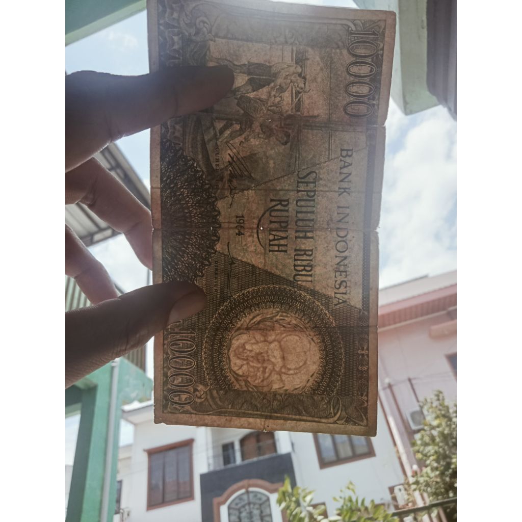10.000 rupiah pekerja hijau 1964 nomer seri RFU 02434