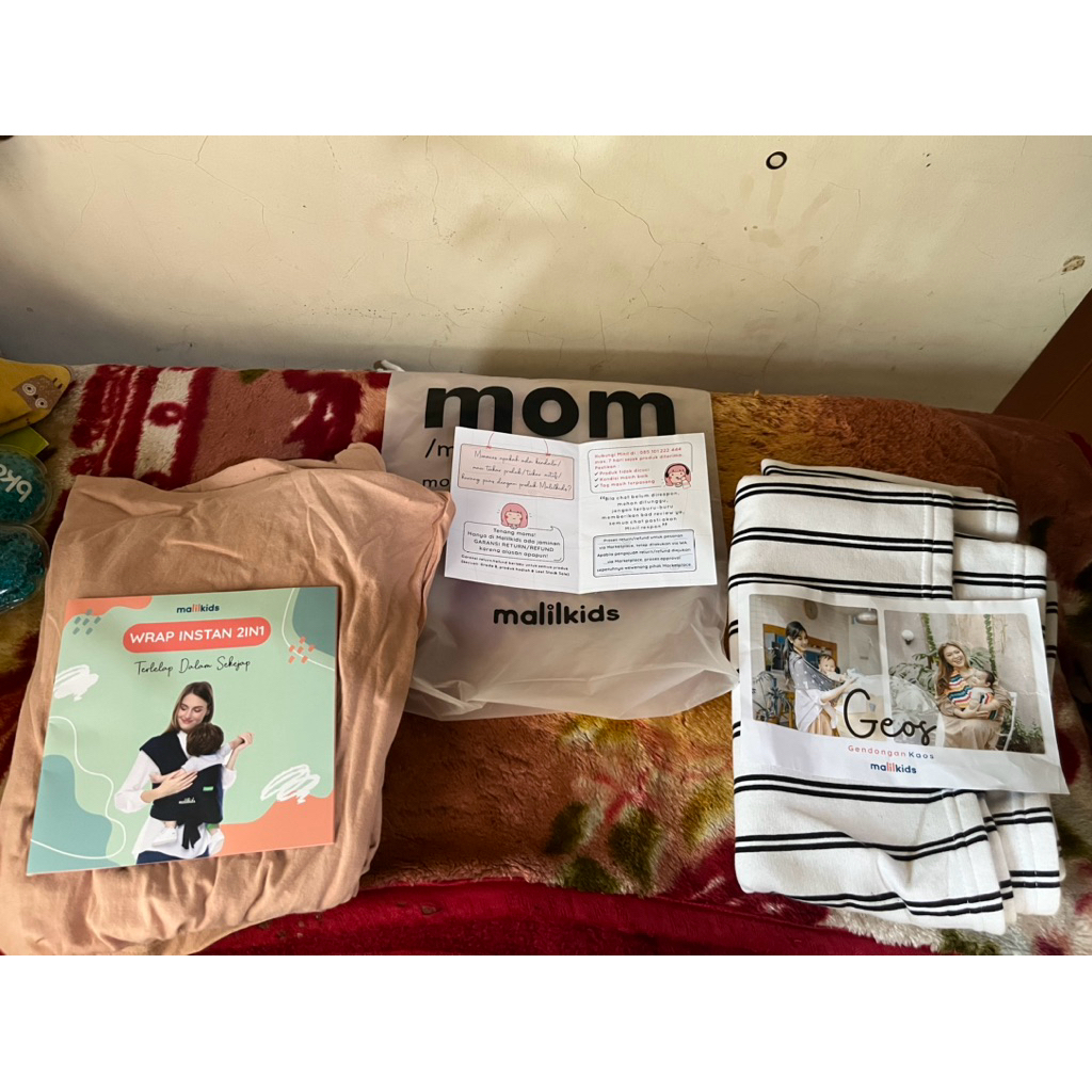 preloved gendongan m shape instant malilkids size small Free Geos