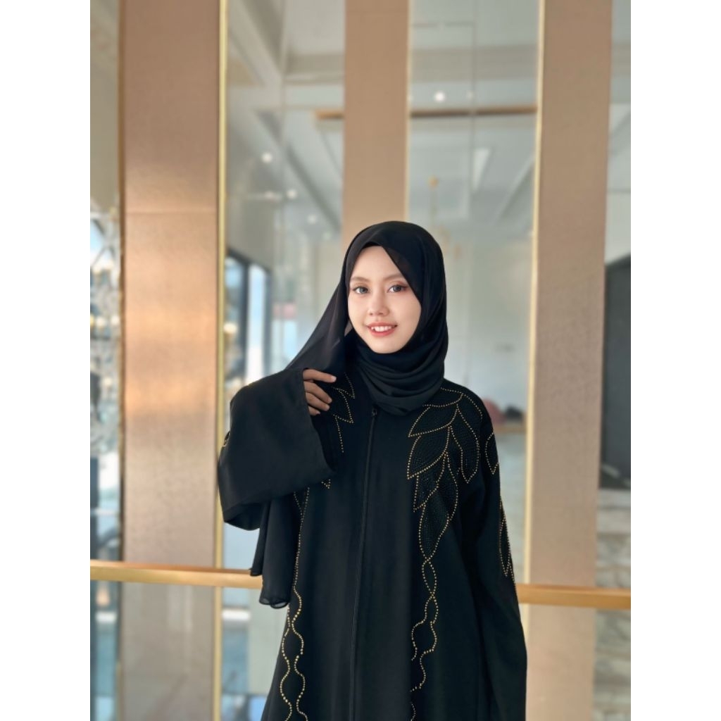 ABAYA SHIRAZ MEWAH CANTIK FULL RESLETING MATA BLINK DAUN KOMBINASI WARNA HITAM & GOLD BAHAN JETBLACK