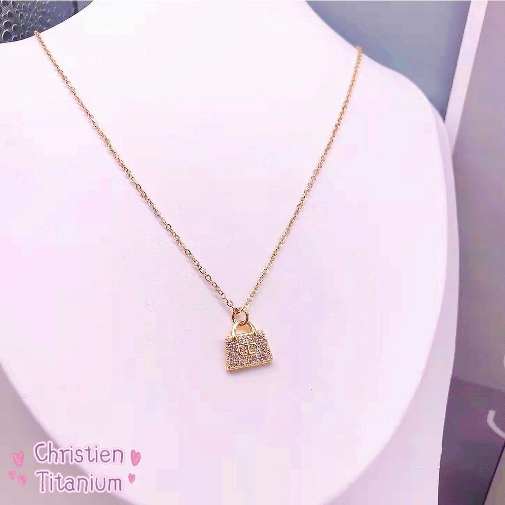 Kalung Titanium Liontin Tas Permata Zircon Gold