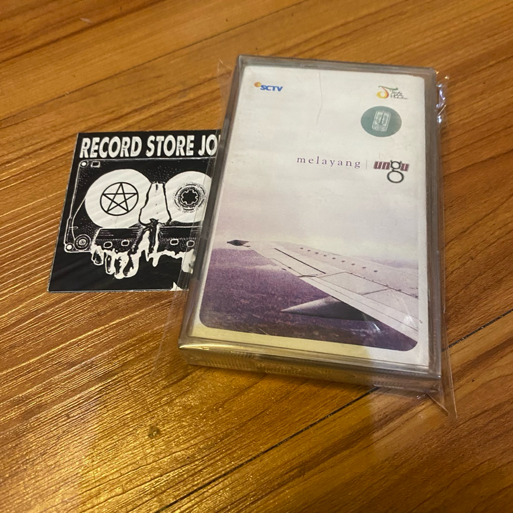 kaset ungu - melayang