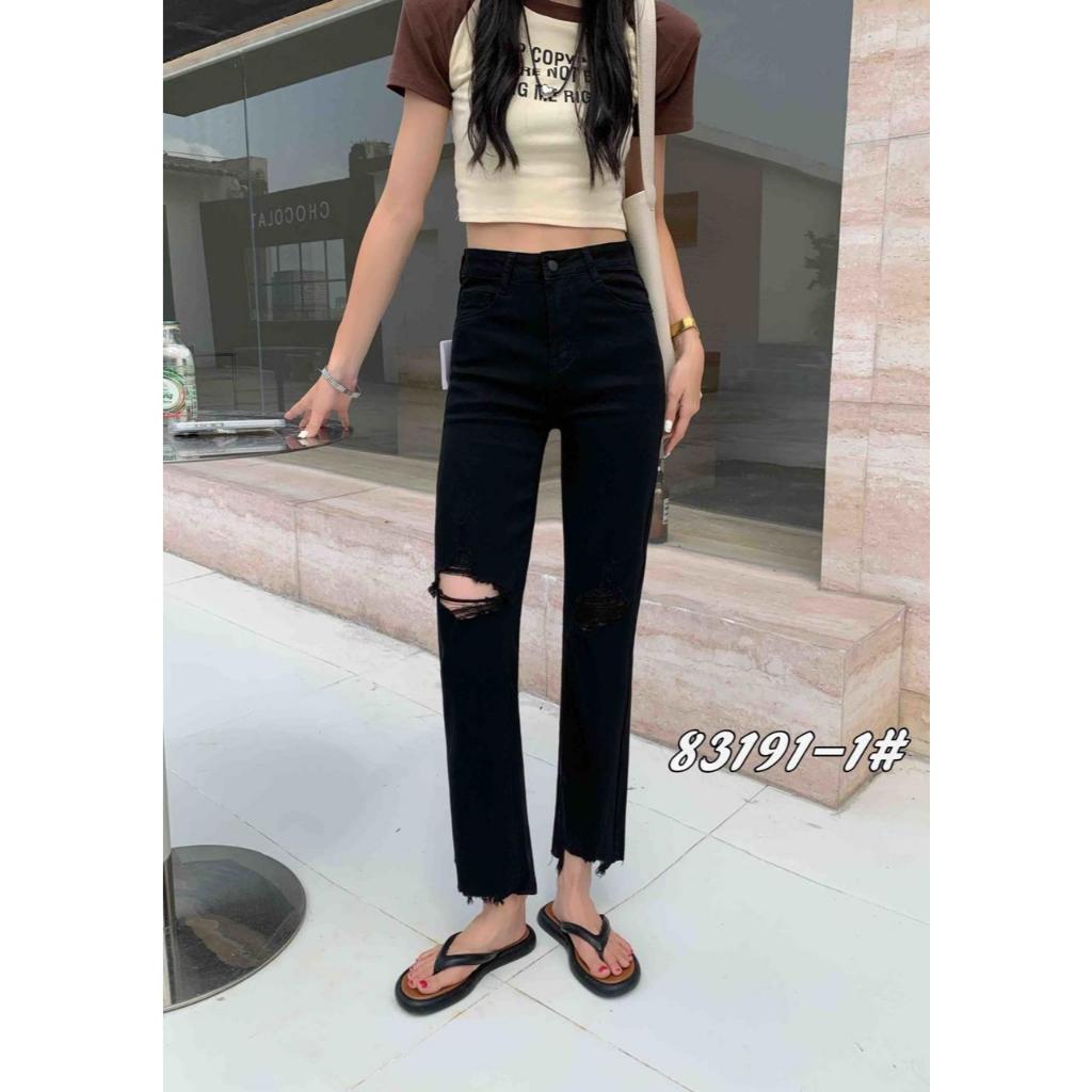 Celana hitam sobek