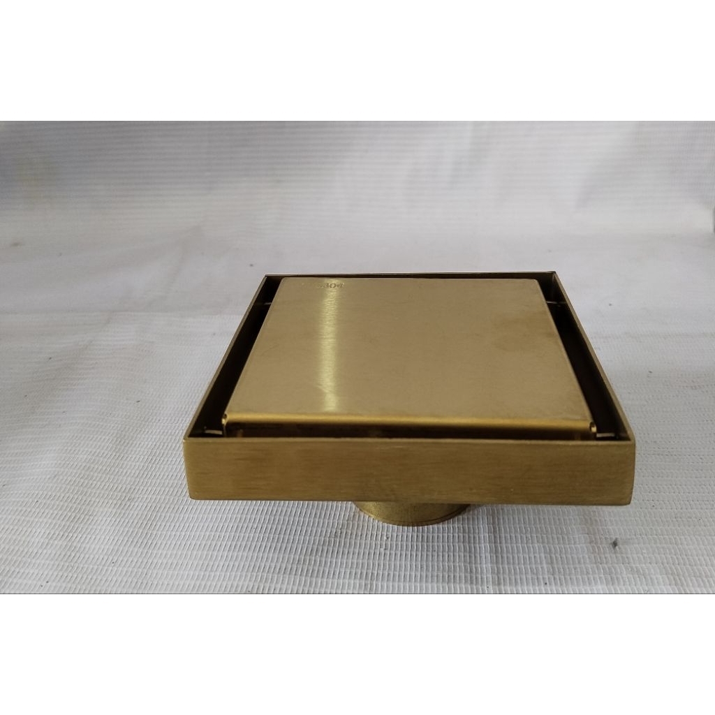 saringan pembuangan air lantai kamar mandi kuningan