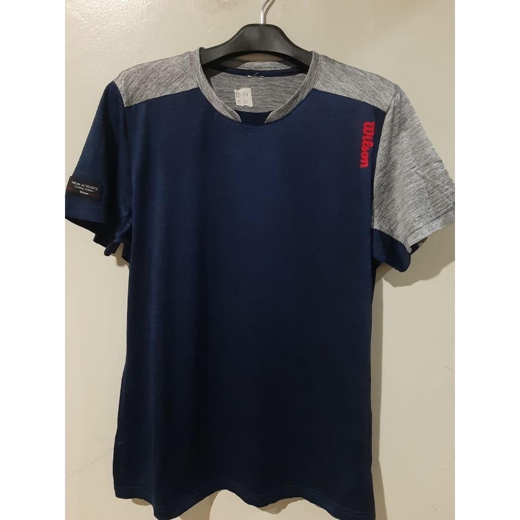 t-shirt kaos olah raga Wilson warna biru navy kombinasi Freeloved/bekas/thrift/second/seken