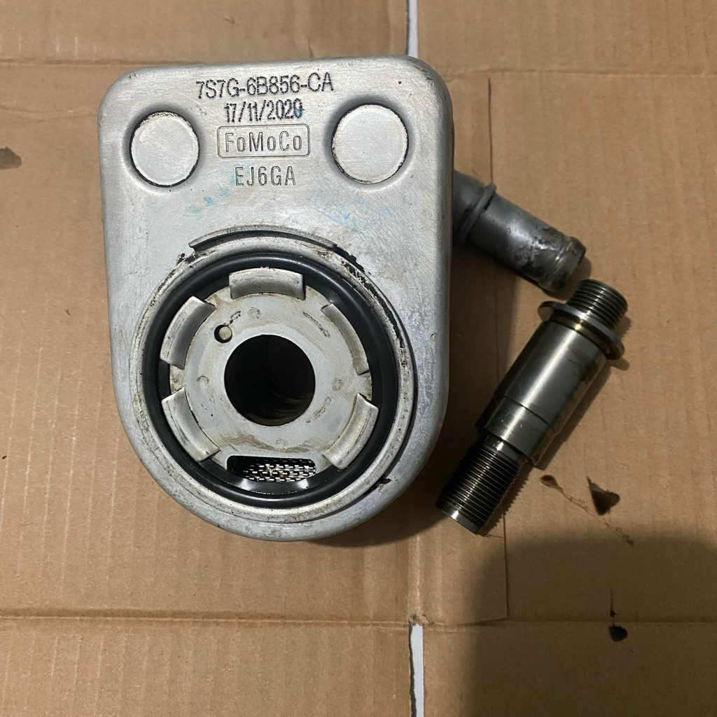 oil oli cooler mesin ford fiesta 1.4 copotan mobil original