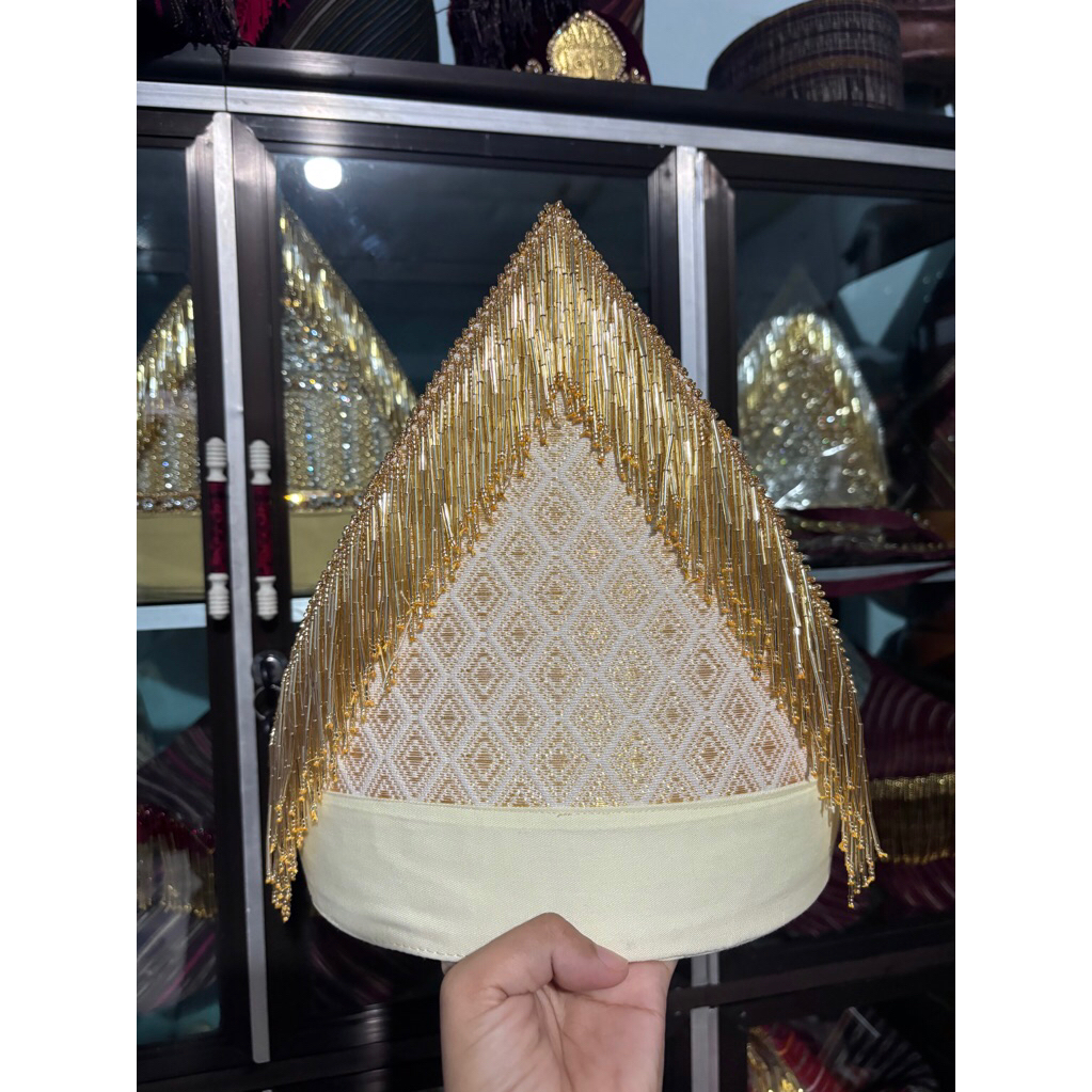 sortopi tumtuman rumbai payet
