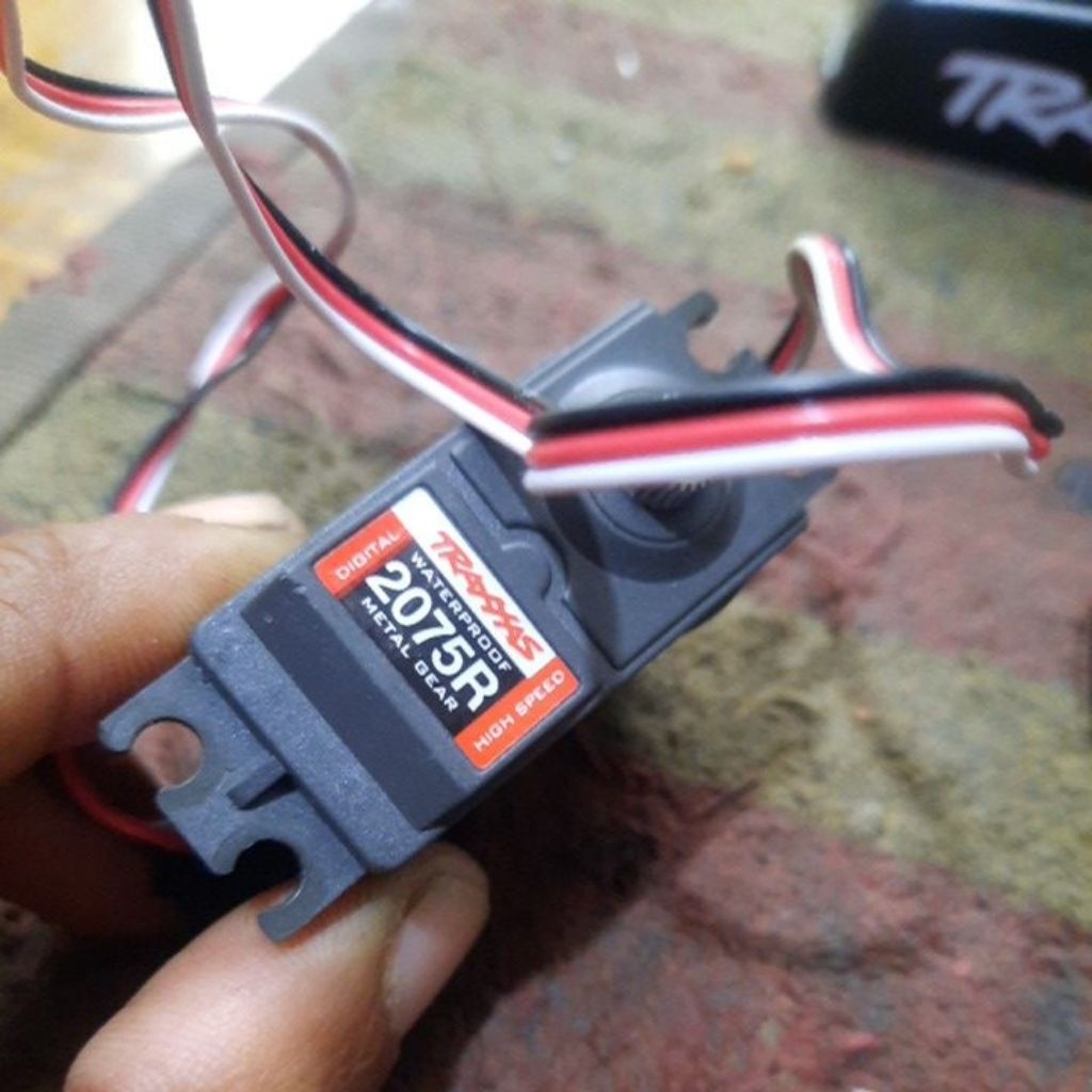 The Traxxas 2075R (Part #2075R) is a high-speed, waterproof digital servo featuring durable all-meta
