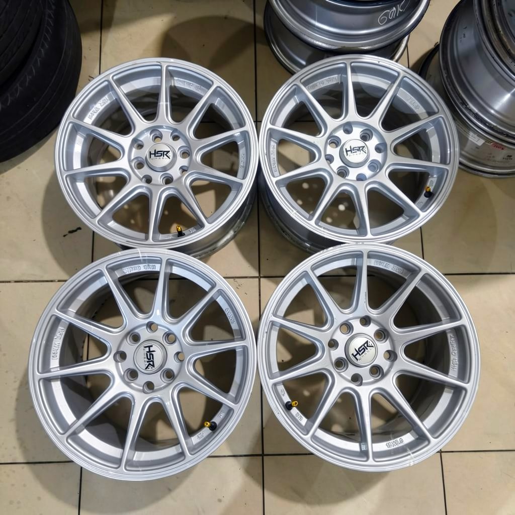VELG MOBIL BEKAS SHINJUKU 7060 HSR R15X7/8 H8X100-114,3 ET35/30 SILVER DASH