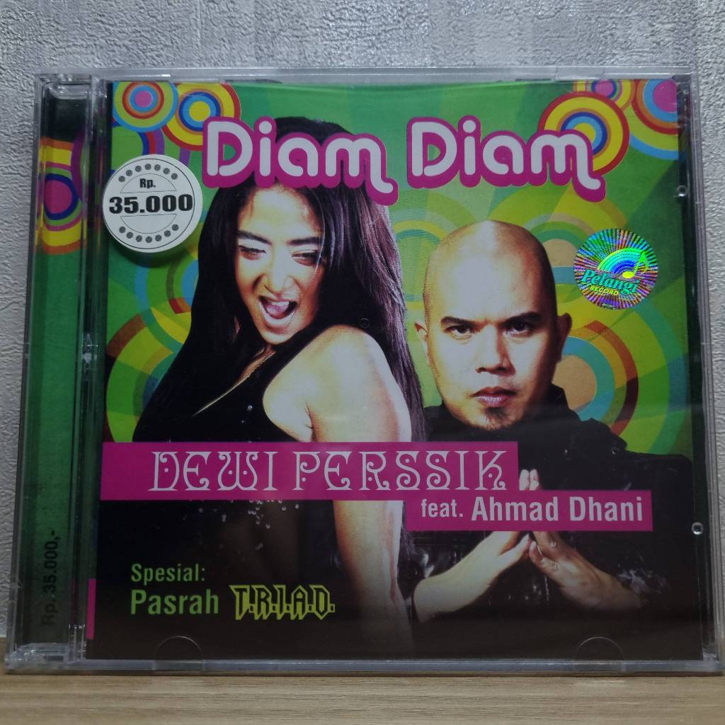 CD Dewi Perssik Ft. Ahmad Dhani - Diam Diam (segel) Dewi Persik