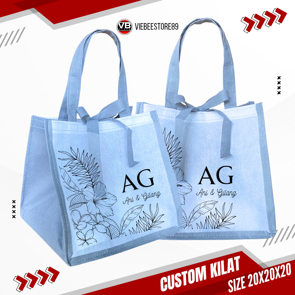 

TAS KOTAK NASI HAJATAN WEDDING ULTAH SEGALA ACARA BAHAN SPUNBOUND FREE CUSTOM NAMA TERMURAH 20x20x20