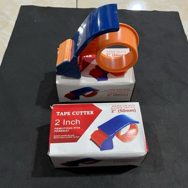 

DISPENSER LAKBAN 2 INCH / DISPENSER TAPE PLASTIK MURAH / TAPE CUTTER pemotong lakban MURAH