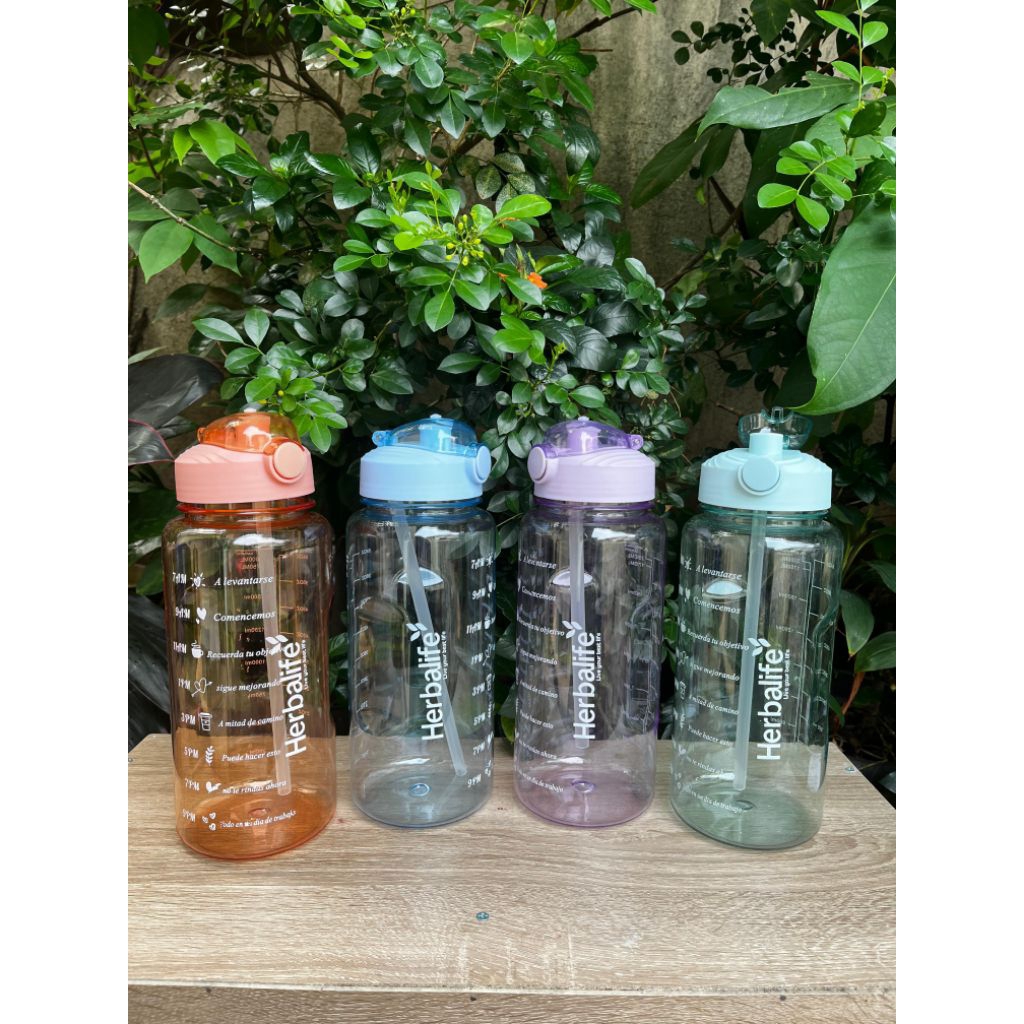 Botol minum  motivasi 2 liter dengan sedotan Botol minum 2 liter murah logo herba*ife