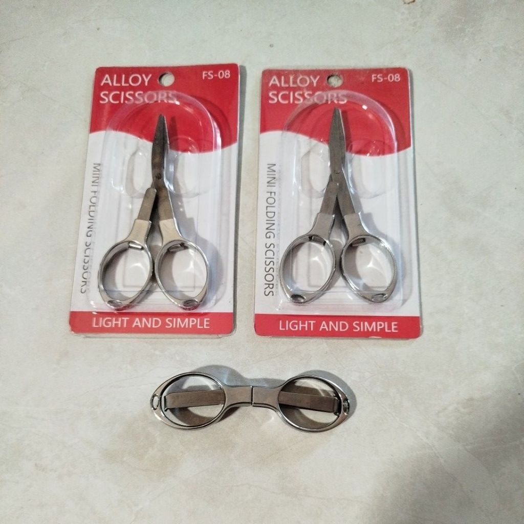 

GUNTING kecil model kacamata