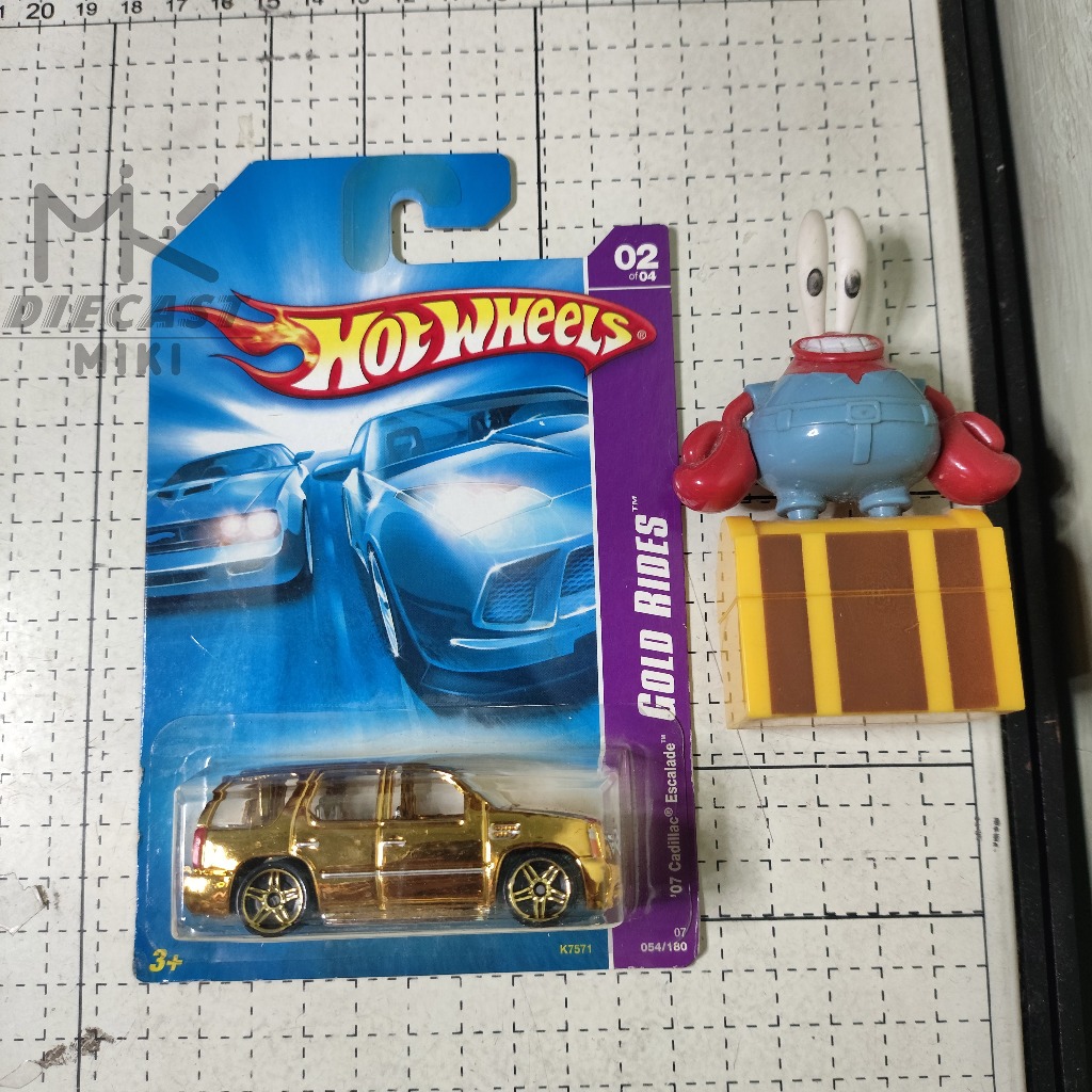 HOT WHEELS 07 CADILLAC ESCALADE GOLD RIDES