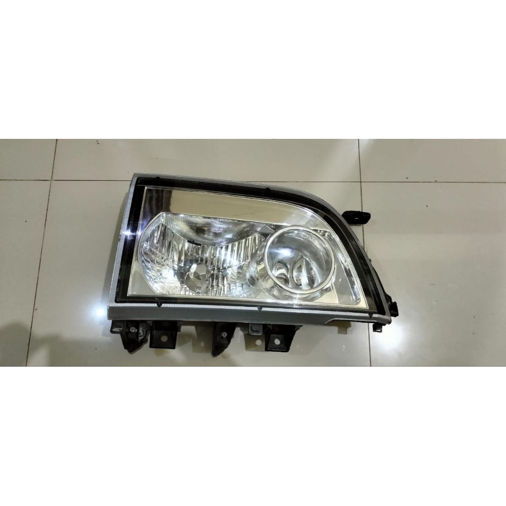 lampu depan headlamp Isuzu elf macan NKR original bagian kanan
