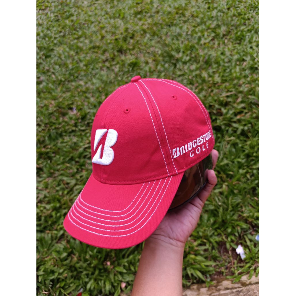 topi golf pria bridgeston original bordir second berkualitas