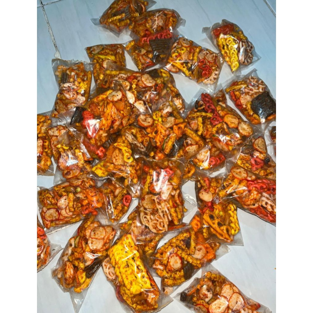 

KERUPUK SEBLAK MIX RASA DAUN JERUK 1KG (isi 34pcs)