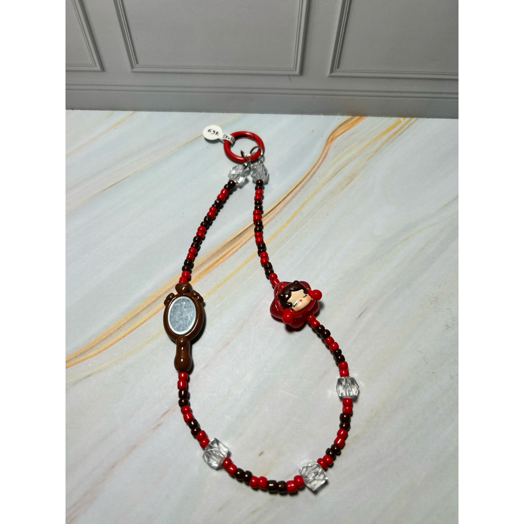 Phone strap skullpanda coklat merah