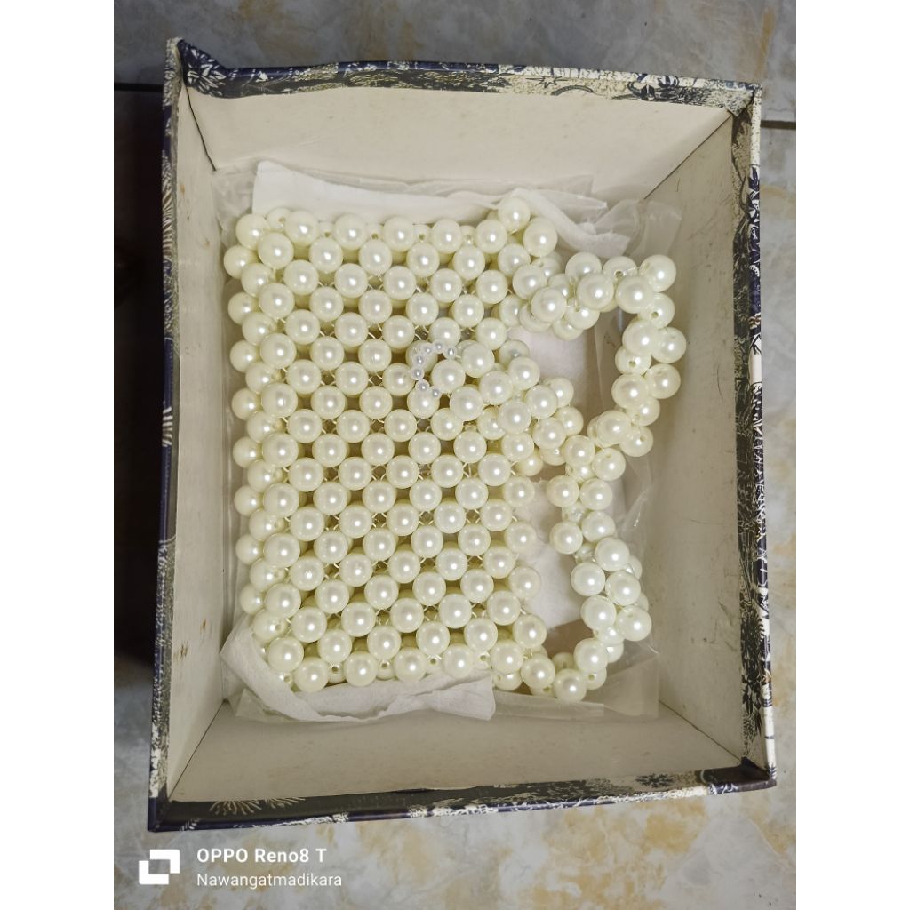 TAS HP MANIK TAS MUTIARA
