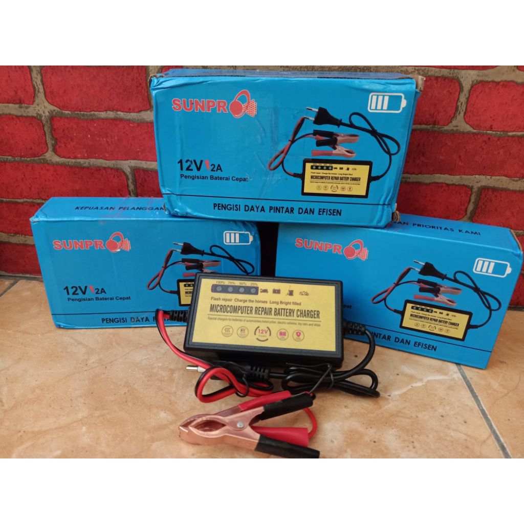 Cas Aki Motor Charger Aki Sunpro cas aki motor mobil Battery 12V 2a Adaptor cas Aki 12V2A new